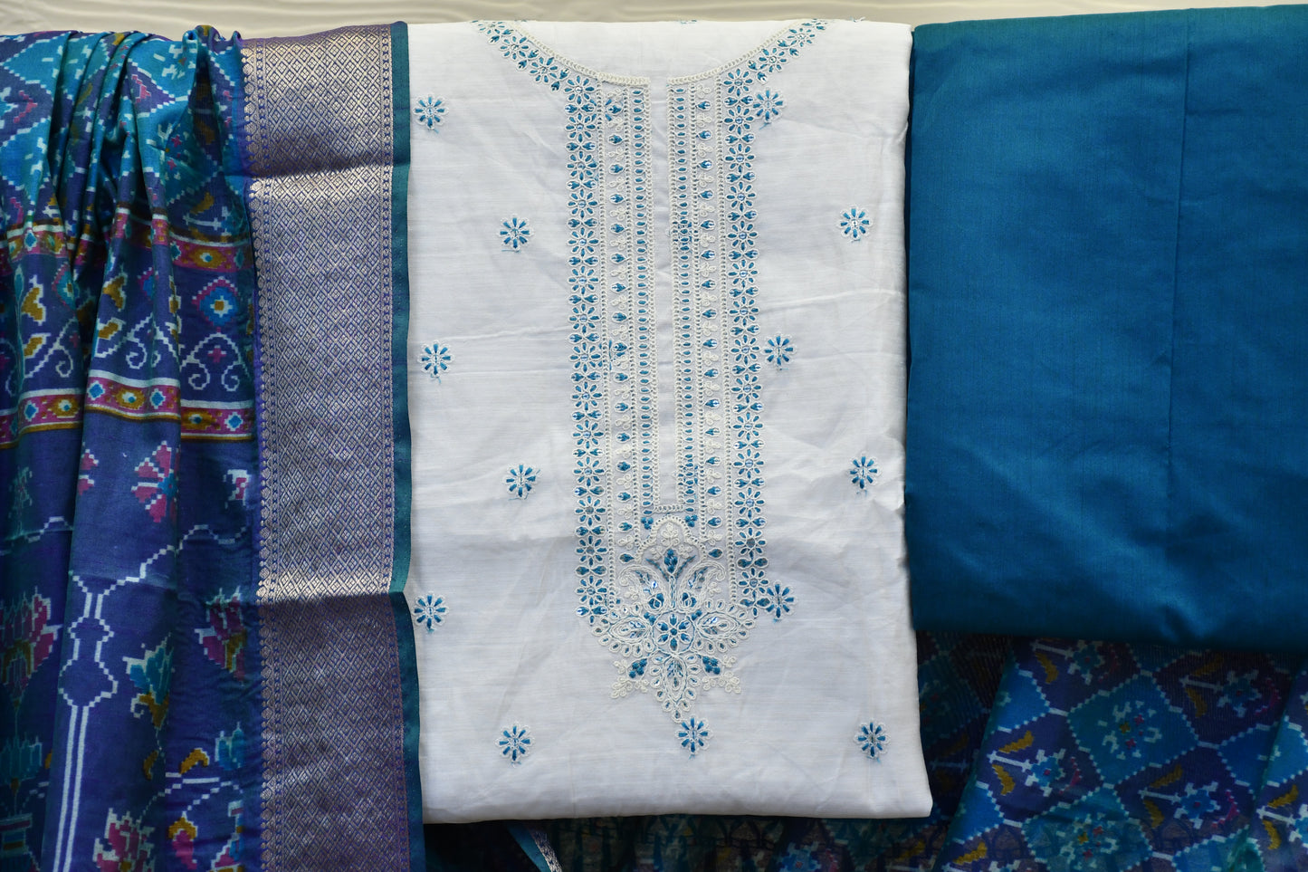 White Raw Silk Dress Material with Patola Dupatta & Coordinated Neck Work