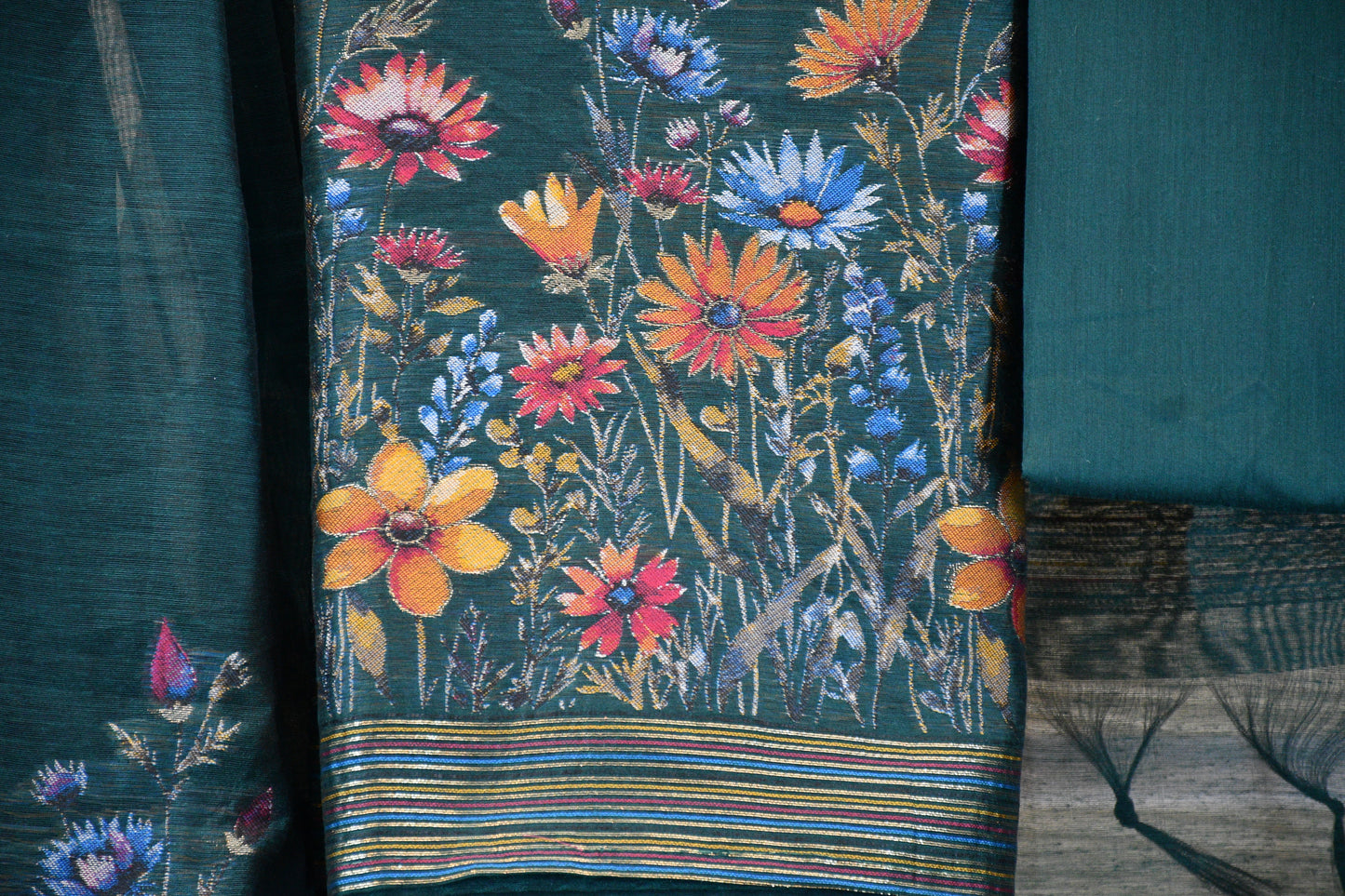 Deep Teal Linen Dress Material with Multicolor Floral Weaving & Tasselled Dupatta