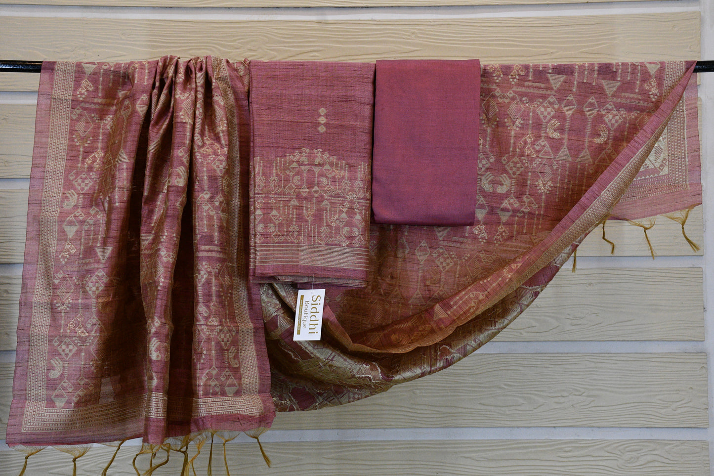 Dusky Rose Handwoven Linen Dress Material with Tribal-Inspired Zari Motifs & Tasselled Dupatta