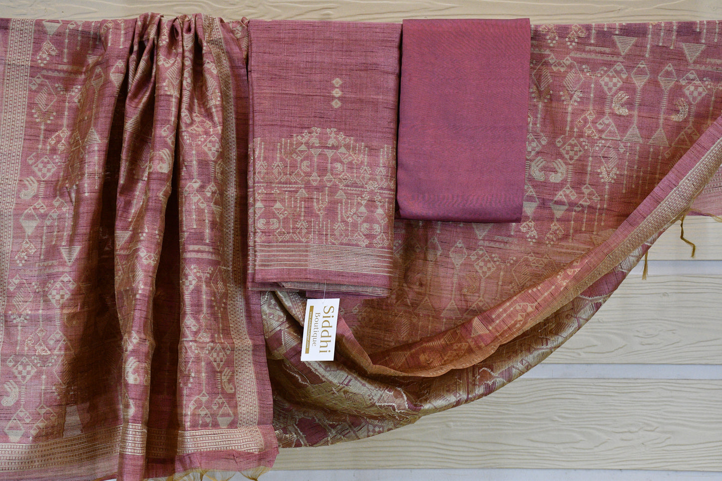 Dusky Rose Handwoven Linen Dress Material with Tribal-Inspired Zari Motifs & Tasselled Dupatta