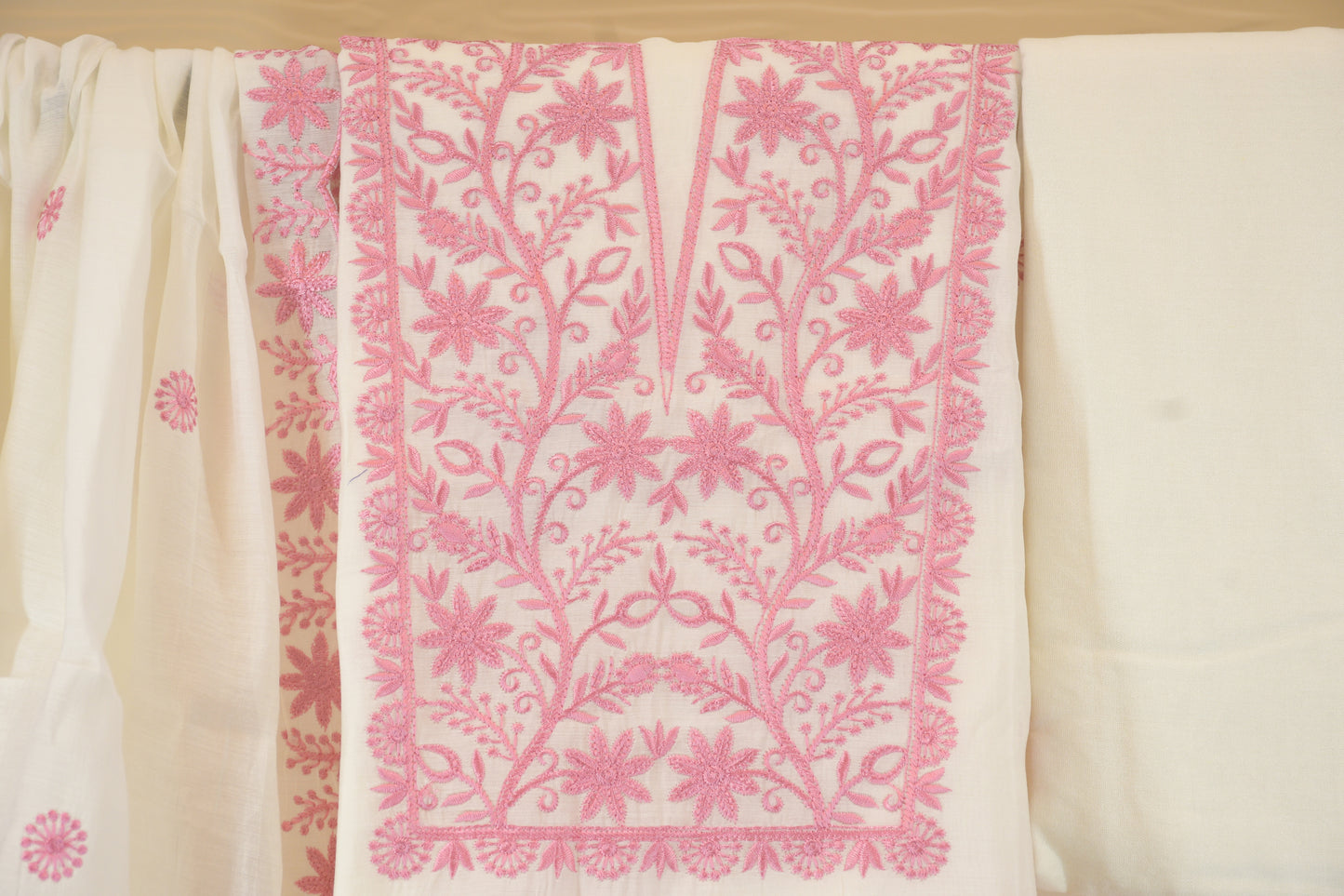 Blushing Vines: Dress Material with Pink Embroidered Neckline
