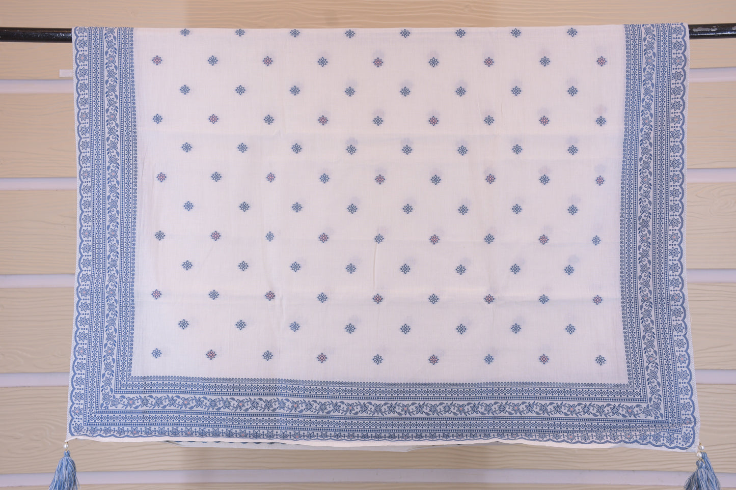 Porcelain Blooms: White Dress Material with Blue Yoke Detail