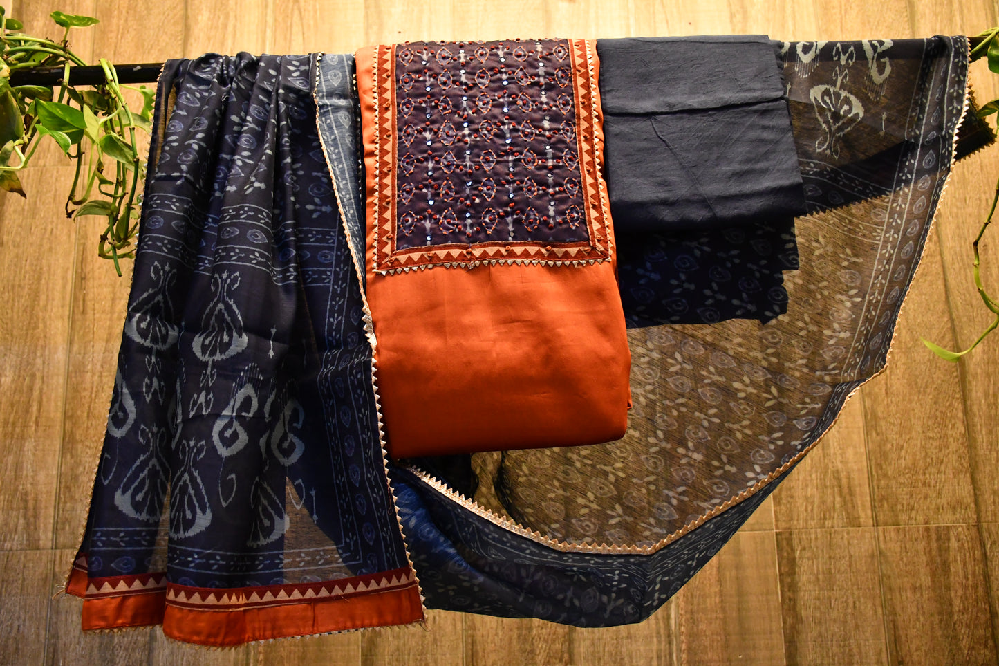 Orange and blue dress Material with printed dupatta.