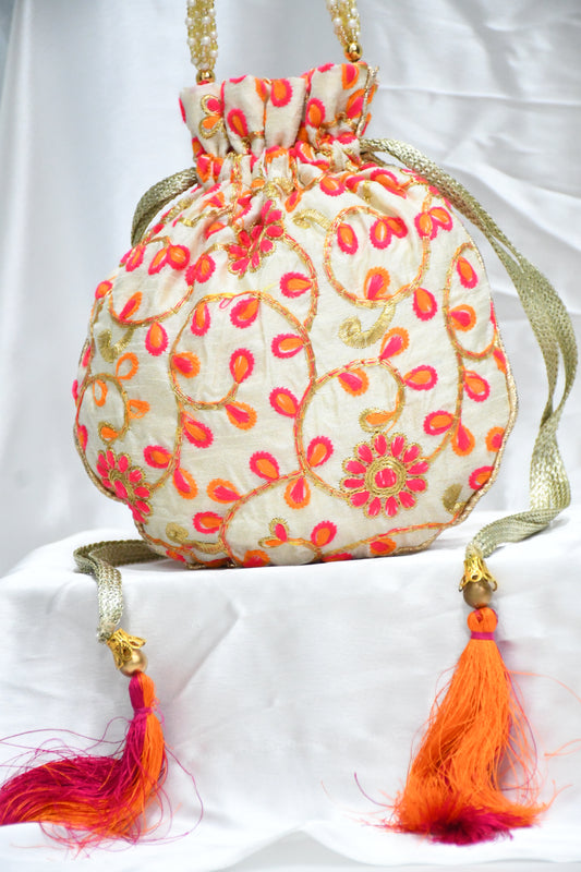 Potli bags in pink and orange petals