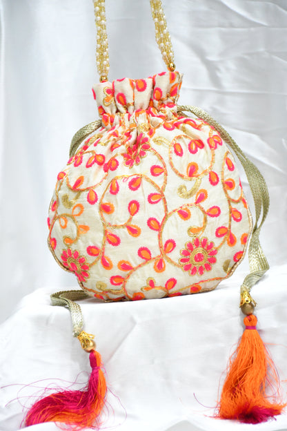 Potli bags in pink and orange petals