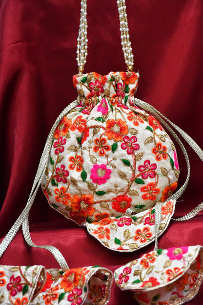 Floral embroided round potli bag