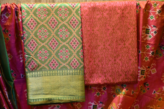 Pink and green silk patola dress material