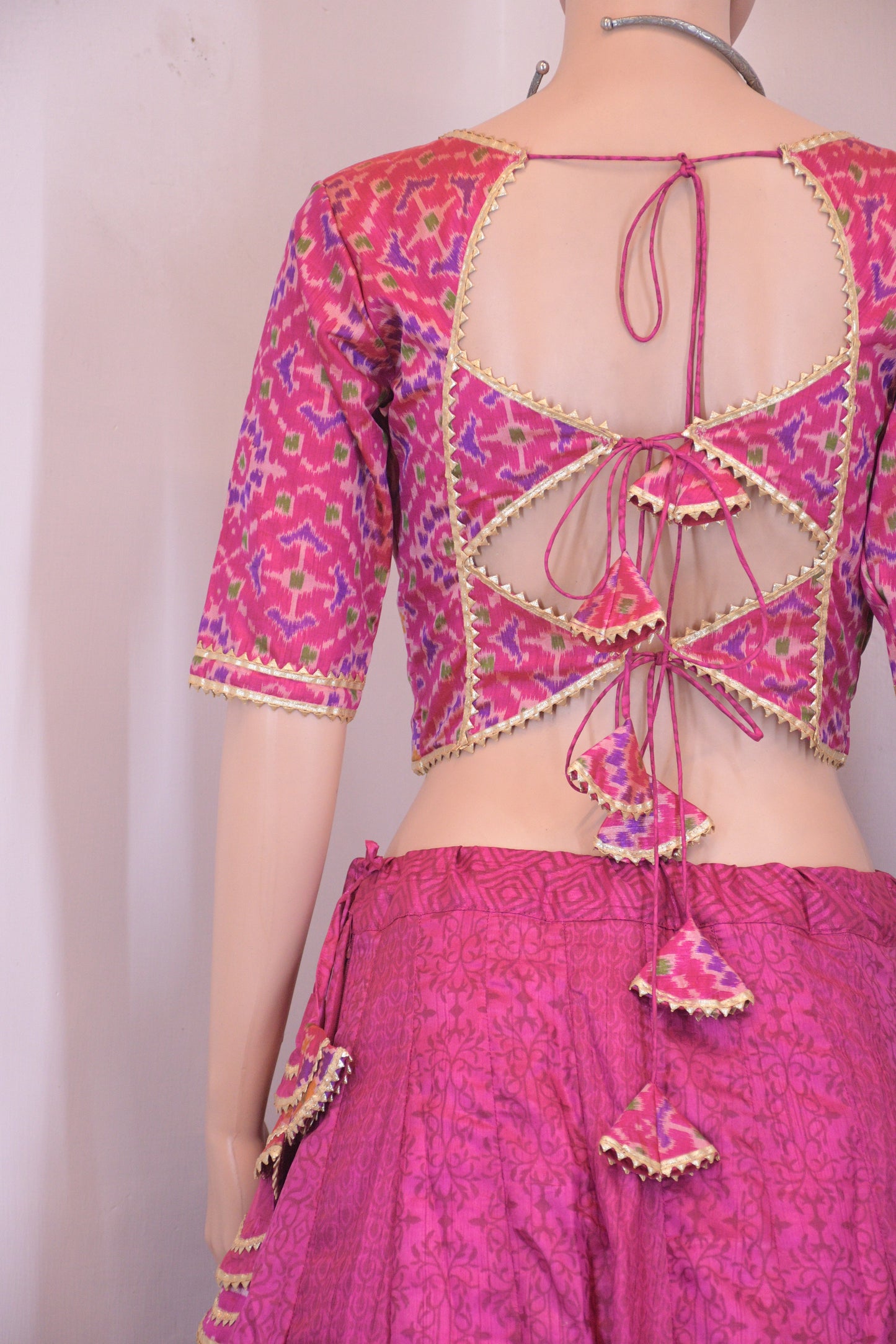 Magenta Silk Patola Chanya Choli with Intricate Border Detailing | Siddhi Boutique