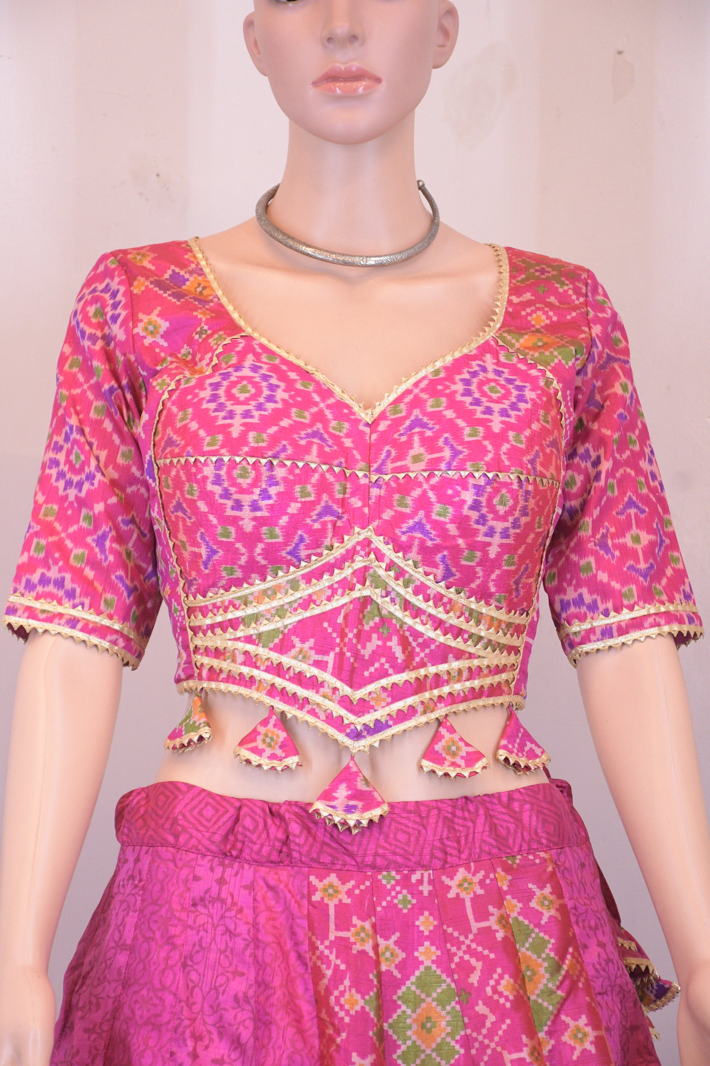 Magenta Silk Patola Chanya Choli with Intricate Border Detailing | Siddhi Boutique
