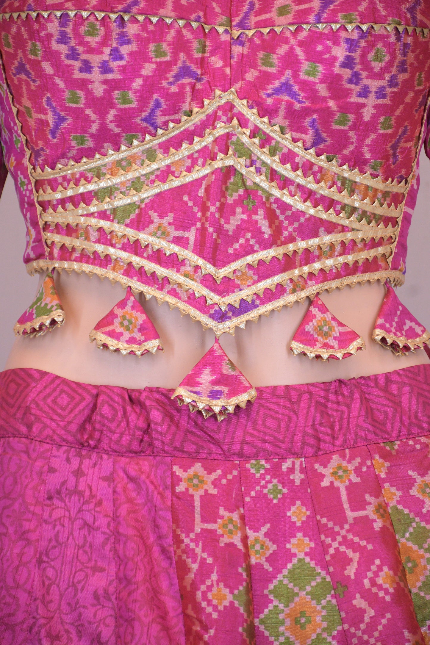 Magenta Silk Patola Chanya Choli with Intricate Border Detailing | Siddhi Boutique