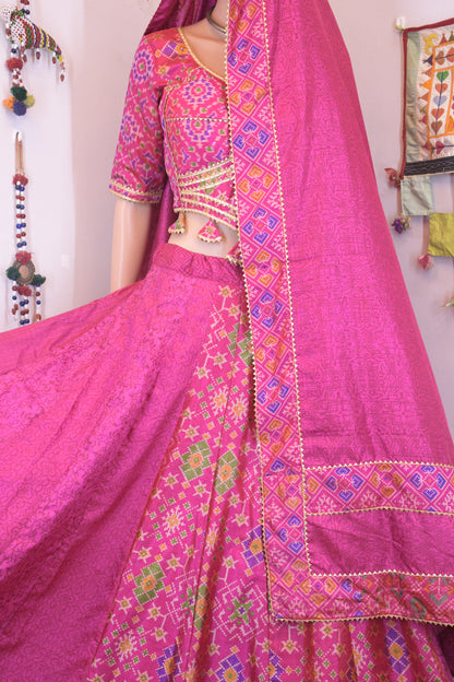 Magenta Silk Patola Chanya Choli with Intricate Border Detailing | Siddhi Boutique